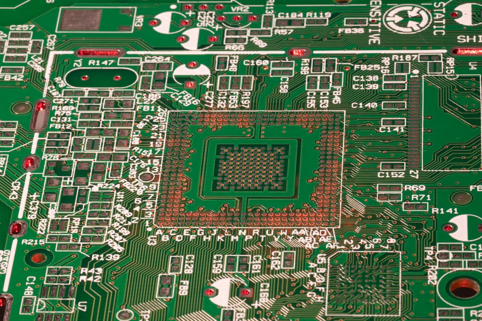High-resolution close view of traces pads and component footprints on a printed circuit board